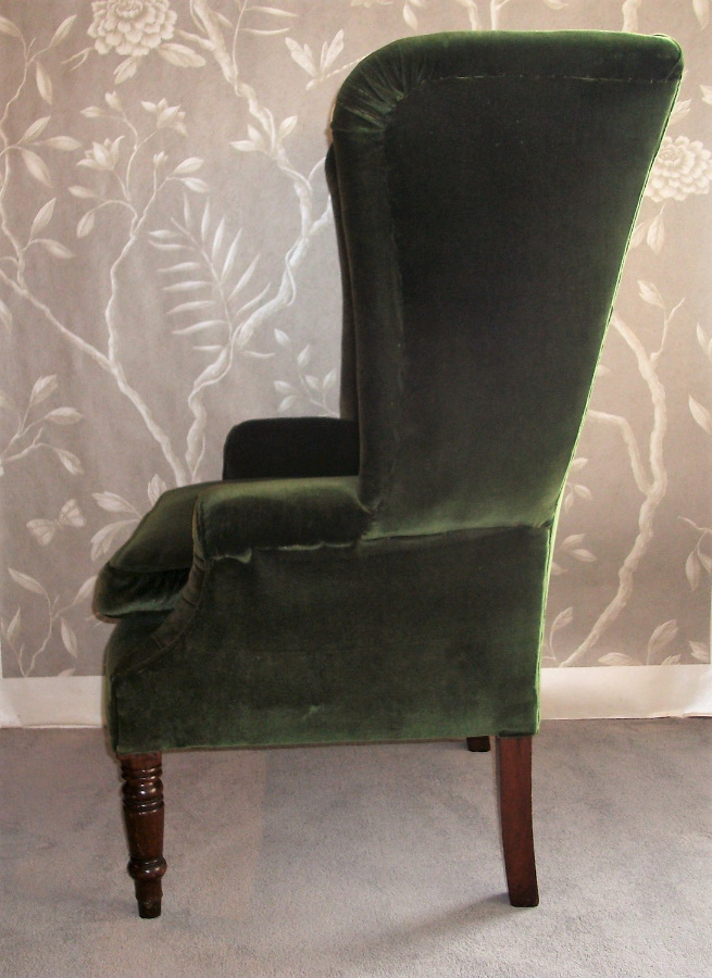 antique wing back armchair